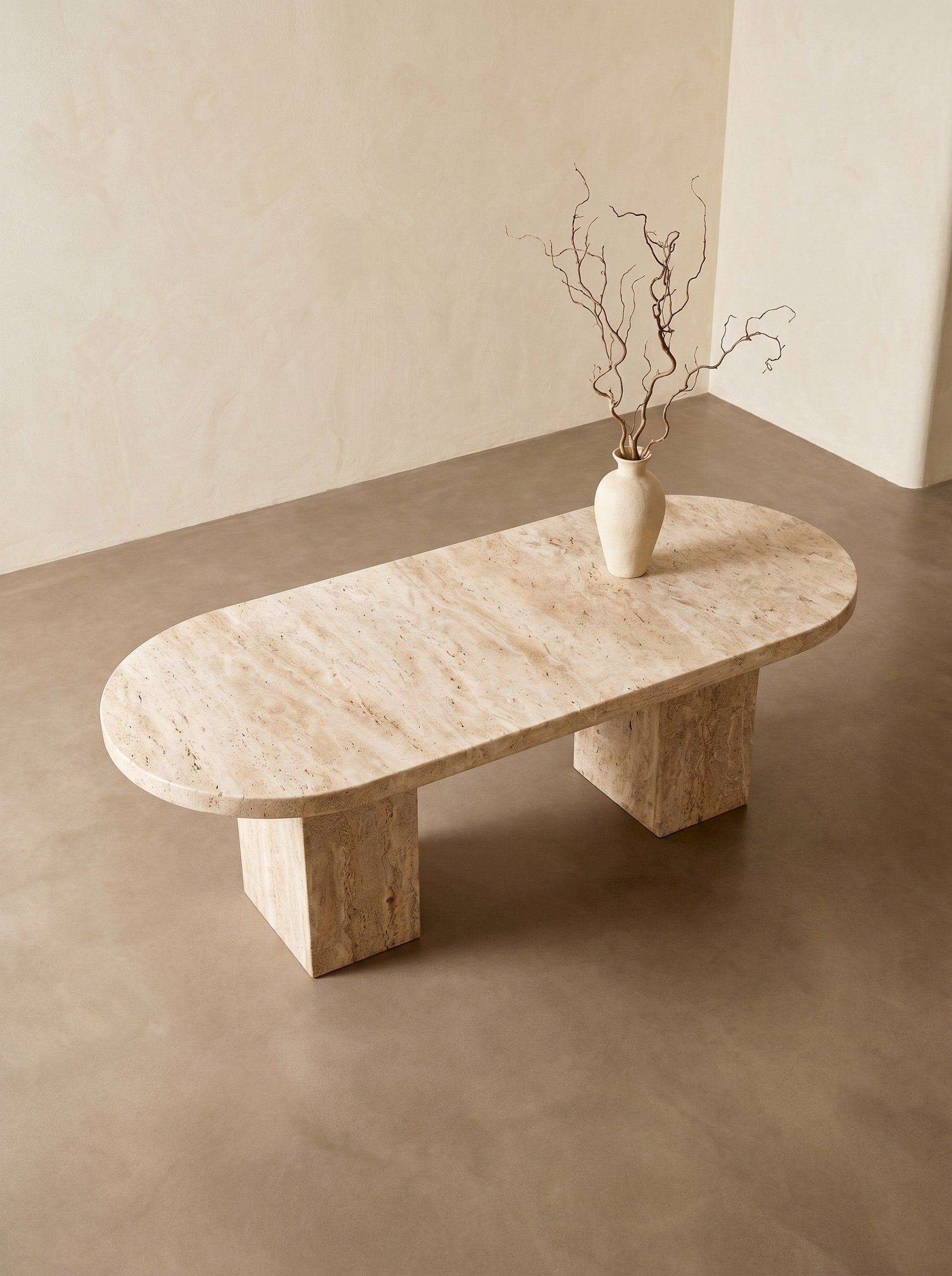 Ovale Dining Table in Travertine